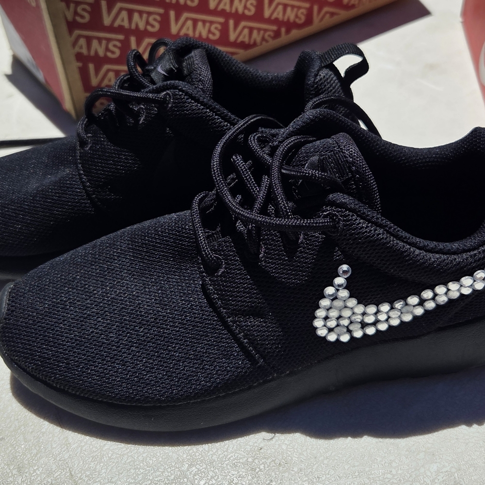 Nike Black Athletic Shoes with Silver Accents